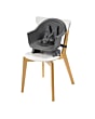 2710043111_2024_maxicosi_homeequipment_highchair_moa_graphite_beyondgraphite_modeboosterwithouttray_3qrtleft